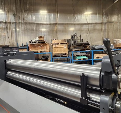A custom metal fabrication machine in a factory.